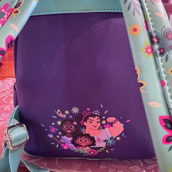 Loungefly Disney Mirabel Encanto Backpack! Perfect for Communicore opening! BNWT - Picture 3 of 5